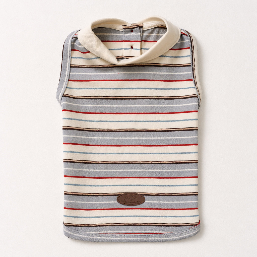Flat lay striped sleeveless pet polo shirt with a cream collar, button detail, and logo patch, featuring casual dog apparel and cat clothing for everyday pet style.